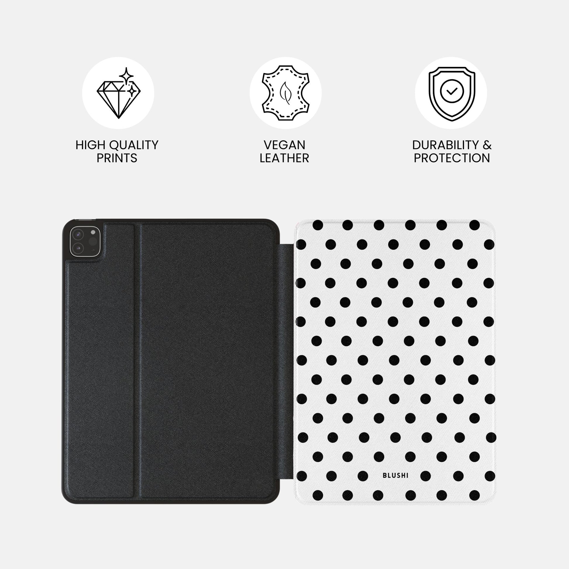 Cute aesthetic iPad case with polka dot design in white and black